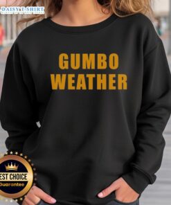 Top T Bob Hebert wears a Gumbo Weather sweatshirt, showcasing vibrant colors and a cozy design perfect for chilly days.