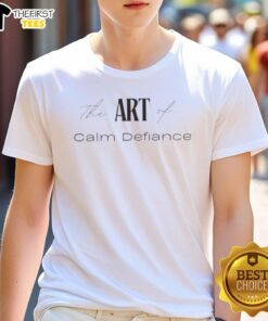 Top The Art Of Calm Defiance T-Shirt featuring a bold design promoting resilience and individuality in fashion.