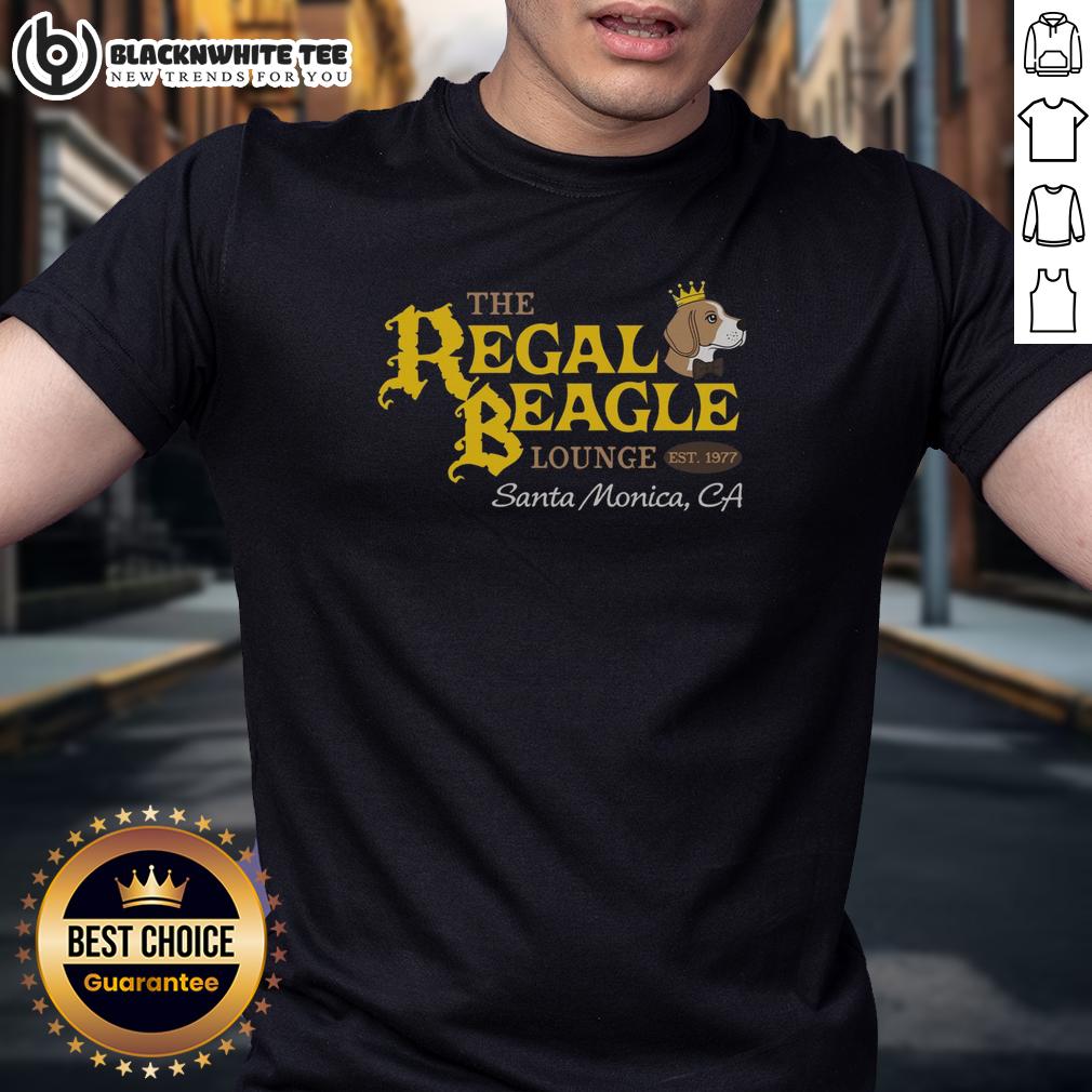 Top The Regal Beagle Lounge Est 1977 T Shirt Top The Regal Beagle Lounge Est 1977 T-Shirt featuring a vintage design celebrating the iconic lounge.