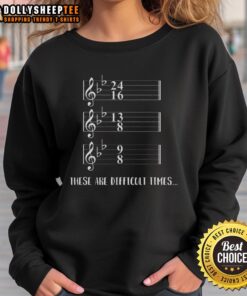 Humorous sweatshirt featuring music notes and the phrase 'These Are Difficult Times' - perfect for music lovers.