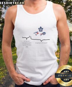 Excited fan wearing a tank top featuring the Toronto Blue Jays, Toronto Maple Leafs, and Buffalo Bills logos.