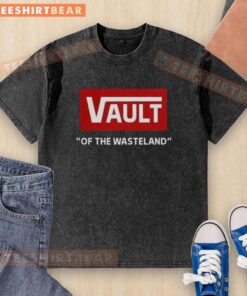 Top Vault Of The Wasteland Washed T-Shirt displayed on a hanger, showcasing its vintage style and distressed graphic design.