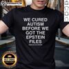Top We Cured Autism Before We Got The Epstein Files T-Shirt featuring bold text and eye-catching design for autism awareness.
