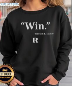 William F. Tate IV wearing a Rutgers Scarlet Knights football sweatshirt, showcasing team spirit and style.