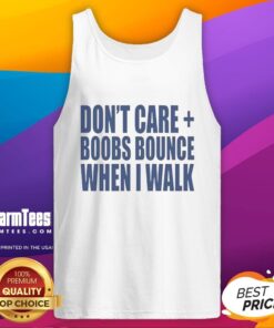 Model wearing 'Nice Don't Care Boobs Bounce When I Walk' tank top, showcasing a stylish and confident casual look.