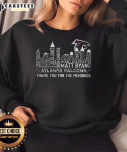 Atlanta Falcons sweatshirt featuring skyline design and player name, celebrating football memories and team spirit.