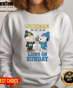 Awesome Charlie Brown Michigan Wolverines sweatshirt, featuring Snoopy with Detroit Lions, perfect for sports fans.