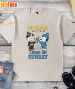 Awesome Charlie Brown and Snoopy washed t-shirt featuring Michigan Wolverines and Detroit Lions for game day fans.