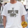 Awesome Hoops For Troops Milwaukee Bucks Basketball T-Shirt featuring team colors and logo, perfect for fans and supporters.