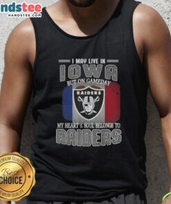 Alt Text: Woman in a Raiders tank top showing team spirit, saying 'I may live in Iowa, but my heart belongs to Raiders'.