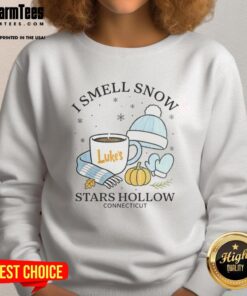 Cozy 'Awesome I Smell Snow' Christmas sweatshirt from Stars Hollow, Connecticut, perfect for winter holiday festivities.