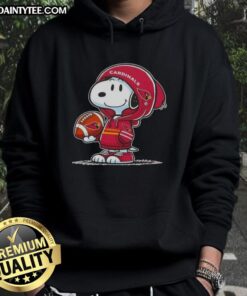 Alt Text: Snoopy in an Arizona Cardinals hoodie, smiling and engaging with fans at an event, showcasing awesome peanuts spirit.