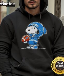 Snoopy wearing a Detroit Lions hoodie, smiling at fans, showcasing awesome Peanuts character style.