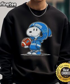 Snoopy wearing a Detroit Lions hoodie smiles at fans in a cozy Awesome Peanuts sweatshirt.