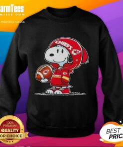 Snoopy wearing a Kansas City Chiefs hoodie, smiling at fans while showcasing an Awesome Peanuts sweatshirt.