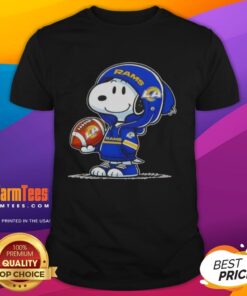 Alt Text: Snoopy wearing a Los Angeles Rams hoodie smiles at fans on an Awesome Peanuts T-shirt, showcasing team spirit.