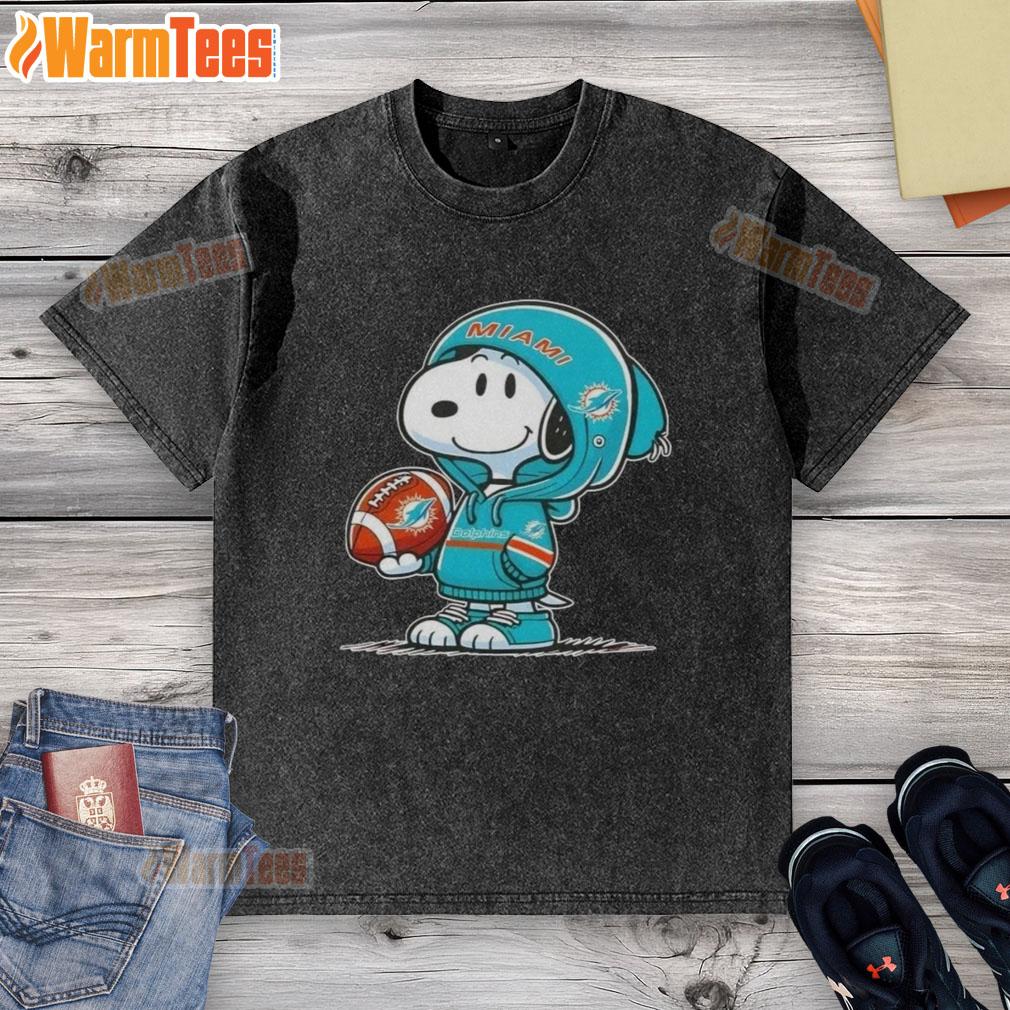 awesome-peanuts-snoopy-wearing-hoodie-miami-dolphins-and-smilling-at-fans-washed-t-shirt Alt Text: Snoopy wearing a Miami Dolphins hoodie, smiling at fans on a washed t-shirt, perfect for Peanuts enthusiasts.