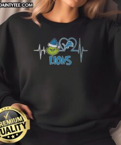 Awesome The Grinch Heartbeat X Detroit Lions football lover sweatshirt, perfect for fans celebrating the holidays.
