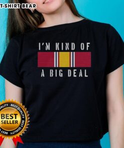 Alt Text: Cute Anchorman meme featuring Brian Kerg in a ladies tee, showcasing the National Defense Service Medal humorously.