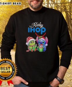 Cute Baby Grinch and Stitch in IHOP Merry Christmas sweatshirt, perfect for festive holiday celebrations.