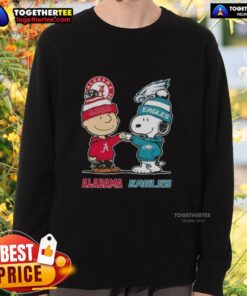 Alt Text: Cute Charlie Brown and Snoopy sweatshirt featuring Alabama Crimson Tide and Philadelphia Eagles logos.