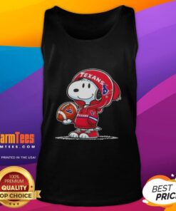 Alt Text: Cute Peanuts Snoopy wearing a Houston Texans hoodie, smiling at fans while showcasing a fun tank top design.