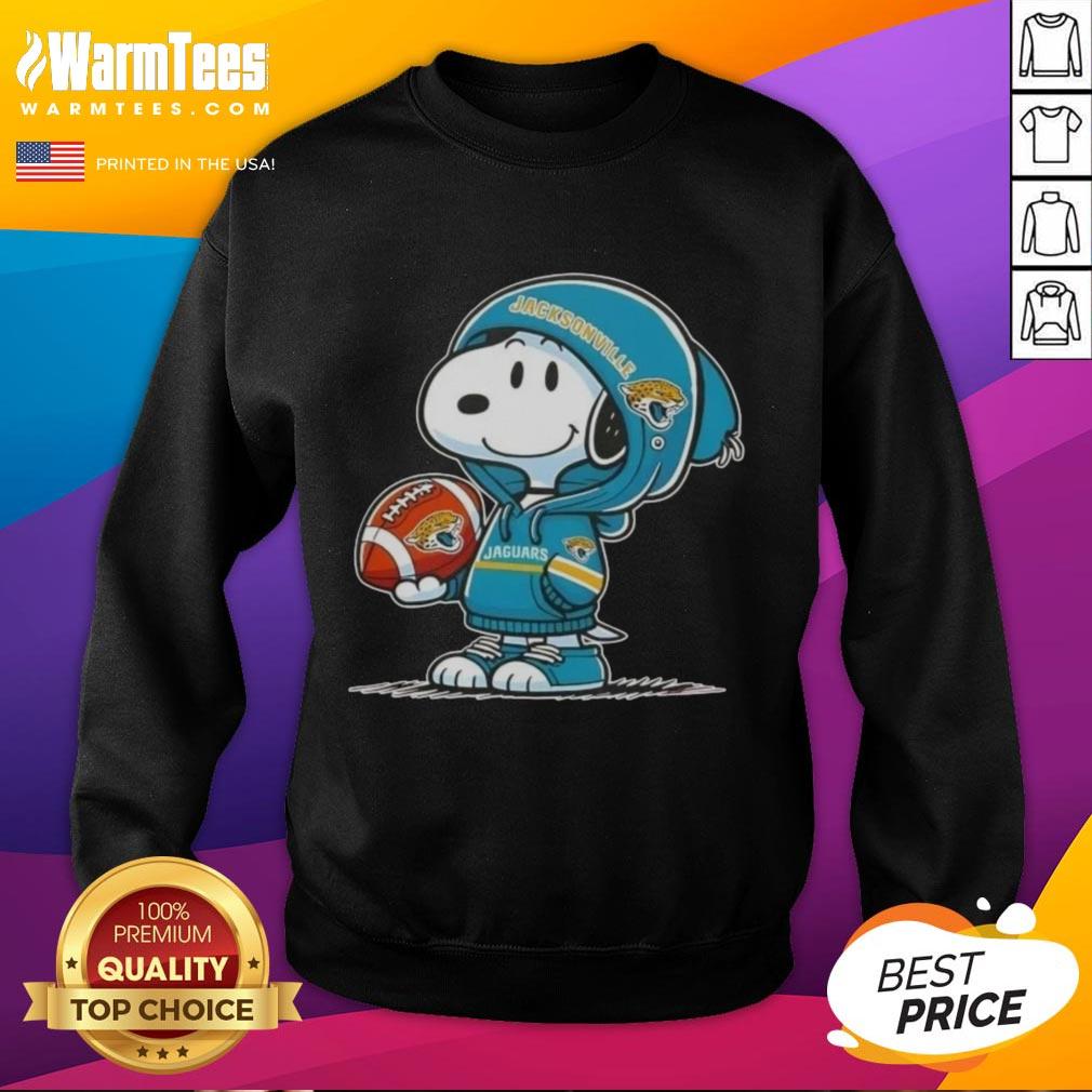 cute-peanuts-snoopy-wearing-hoodie-jacksonville-jaguars-and-smilling-at-fans-sweatshirt Cute Peanuts Snoopy wearing a Jacksonville Jaguars hoodie, smiling at fans in a cozy sweatshirt.
