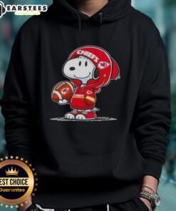 Alt Text: Cute Peanuts Snoopy in a Kansas City Chiefs hoodie, smiling at fans with a cheerful expression.