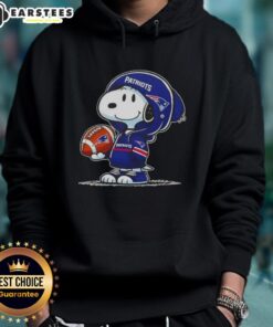 Cute Peanuts Snoopy in a New England Patriots hoodie, smiling at fans with enthusiasm and charm.