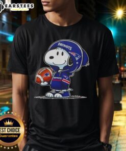 Alt Text: Cute Peanuts Snoopy in a New England Patriots hoodie smiling at fans on a fun T-shirt design.