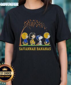 Alt Text: Cute Snoopy and friends on a Savannah Bananas ladies tee, celebrating 'It's the Most Wonderful Time of the Year'.