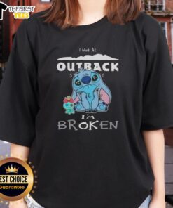 Alt Text: Cute Stitch I Work at Outback Steakhouse I'm Broken Ladies Tee featuring a playful design and vibrant colors.