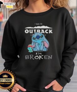 Alt Text: Cute Stitch sweatshirt featuring 'I Work at Outback Steakhouse, I'm Broken' design for casual, fun wear.