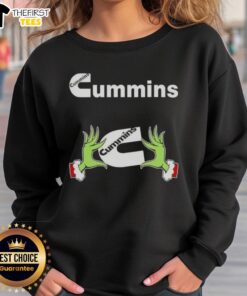 Funny Grinch hands holding a heart on a Cummins Christmas sweatshirt, perfect for festive holiday cheer.