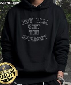 Funny hot girl wearing a Shit The Hardest hoodie, showcasing a playful and trendy fashion style. Perfect for casual wear.