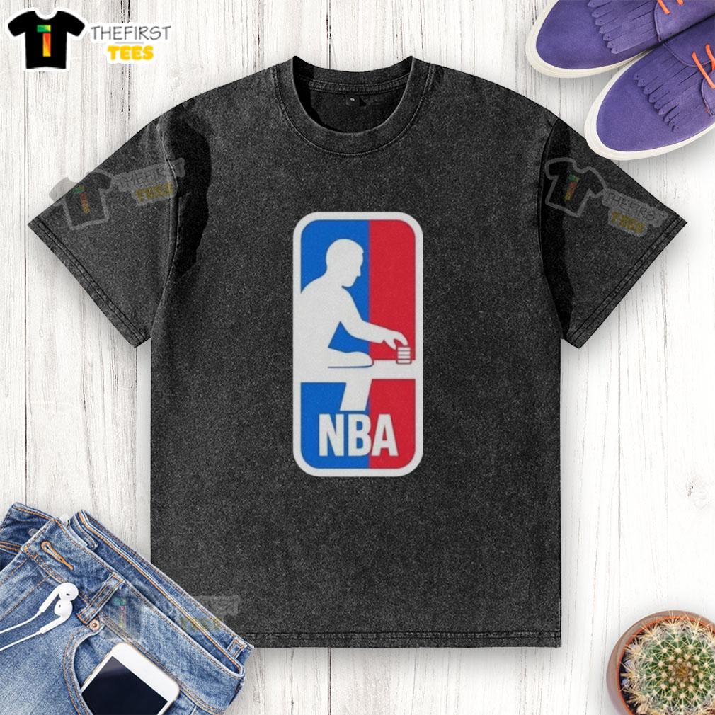 funny-nba-logo-parody-washed-t-shirt Funny NBA logo parody on a washed t-shirt, featuring a playful twist on the classic basketball emblem design.