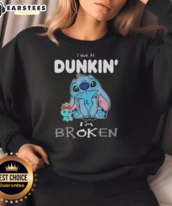 Alt Text: Humorous 'I Work At Dunkin, I'm Broken' sweatshirt design featuring playful graphics, perfect for Dunkin' fans.