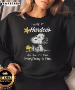 Alt Text: Funny Snoopy and Woodstock illustration on a sweatshirt saying I work at Hardee's, it's fine, I'm fine, everything is fine.