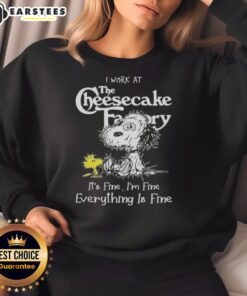 Funny Snoopy and Woodstock sweatshirt with 'I Work at The Cheesecake Factory' slogan, perfect for casual wear.