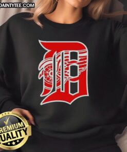 Good Detroit Tigers X Red Wings logo mashup sweatshirt featuring vibrant team logos on a cozy design.