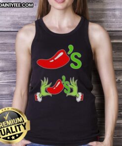 Good Grinch hands holding chilis on a Merry Christmas tank top, perfect for festive holiday celebrations.