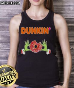 Good Grinch hands holding a Dunkin' Donut in a Merry Christmas tank top, perfect for holiday festivities.