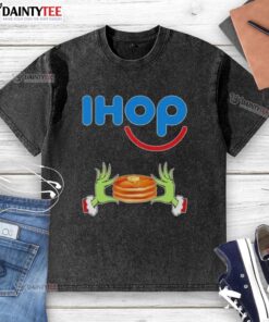 Alt Text: Good Grinch hands love IHOP Merry Christmas washed t-shirt featuring festive design and vibrant colors.