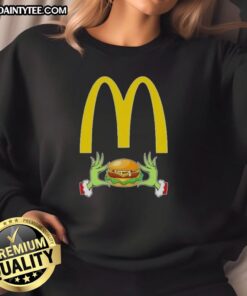 Good Grinch Hands Love McDonald's Merry Christmas Sweatshirt featuring festive design and cozy style for the holidays.