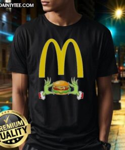 Good Grinch Hands Love McDonald's Merry Christmas T-Shirt featuring festive design and vibrant colors for the holiday season.