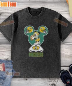 Good Mickey hands forming a heart in a Green Bay Packers football washed t-shirt, perfect for fans and casual wear.