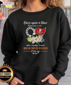 Cozy sweatshirt featuring 'Once Upon A Time There Was A Girl Who Loved Horses And Tampa Bay Buccaneers' design.