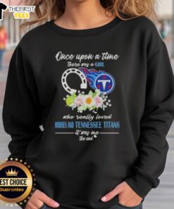 Girl wearing 'Once Upon A Time' sweatshirt featuring horses and Tennessee Titans logo, showcasing her love for both.