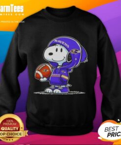 Snoopy in a Baltimore Ravens hoodie smiles at fans, showcasing the Good Peanuts sweatshirt design. Perfect for football fans!
