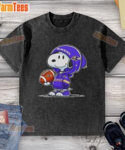 Good Peanuts Snoopy in Baltimore Ravens hoodie smiling at fans on a washed t-shirt, showcasing playful team spirit.